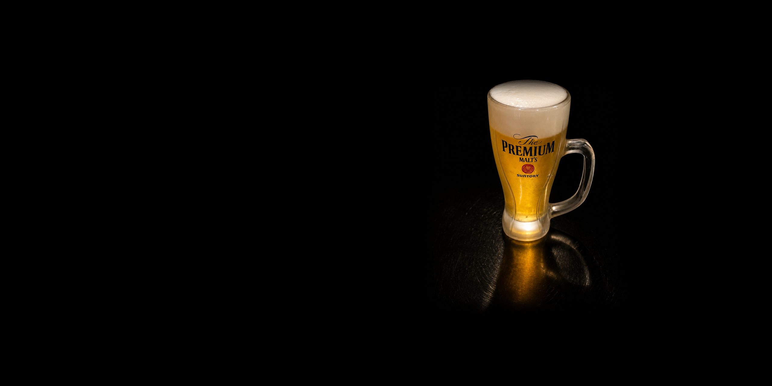 A cold Suntory on tap
