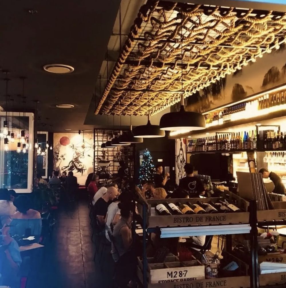 The dining room and bar at night