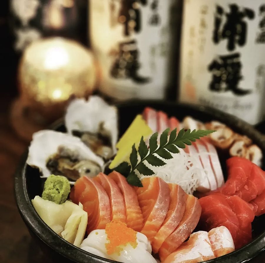 Assorted sashimi and oysters